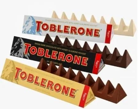 Шоколад Toblerone White білий з медово-мигдальною нугою, 100 г 10310 фото